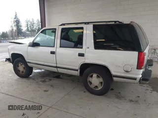 1998 GMC Yukon with VIN 1GKEK13R7WJ700881, listed as a IAAI auction lot 41507538 with 188,396 mi miles. Bid and sale history available at carsss.com. Image 14.