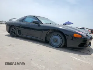 1999 Mitsubishi 3000GT z VIN JA3AM44H6XY002443, wystawiony jako Copart lot #57155505 z przebiegiem 201 588 mil mil oraz Czysty tytuł • Clean title. Historia ofert i sprzedaży dostępna na DreamBid. Obrazek 4.