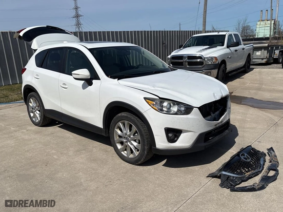 2015 Mazda CX-5 Grand Touring with VIN JM3KE4DY4F0535110, listed as a Copart auction lot 52143565 with 234,452 mi miles and Clean Title. Bid and sale history available at carsss.com. Image 1.