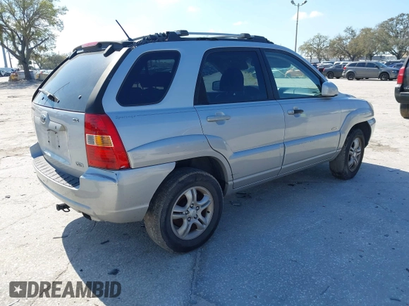 2005 Kia Sportage LX with VIN KNDJE723957128130, listed as a IAAI auction lot 41646193 with 188,142 mi miles and . Bid and sale history available at carsss.com. Image 4.