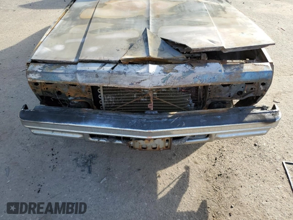 1977 Chevrolet Impala с VIN IL69U7J272968, выставлен на аукционе Copart как лот 75909154 с пробегом Не указан миль и Списание • Salvage title. История ставок и продаж доступна на DreamBid. Изображение 12.
