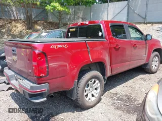 2018 Chevrolet Colorado 4WD LT z VIN 1GCGTCENXJ1214811, wystawiony jako IAAI lot #42418878 z przebiegiem 80 453 mil mil oraz . Historia ofert i sprzedaży dostępna na DreamBid. Obrazek 4.