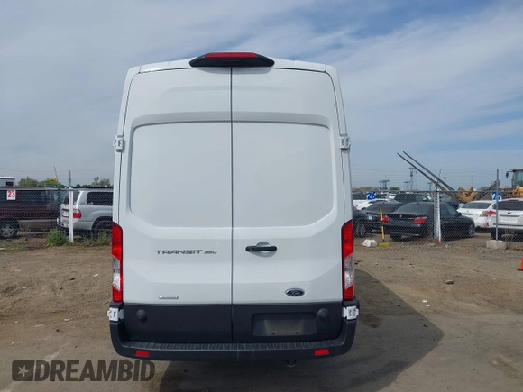 2022 Ford Transit Cargo with VIN 1FTBW3XG9NKA84214, listed as a IAAI auction lot 42033413 with 6,746 mi miles and . Bid and sale history available at DreamBid. Image 17.