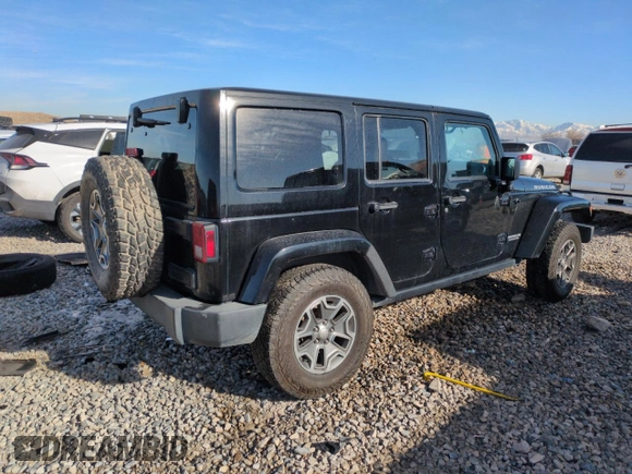 2013 Jeep Wrangler Unlimited Rubicon 10th Anniversary z VIN 1C4HJWFG6DL557085, wystawiony jako Copart lot #41693075 z przebiegiem 139 240 mil mil oraz Szkoda całkowita • Salvage title. Historia ofert i sprzedaży dostępna na DreamBid. Obrazek 3.