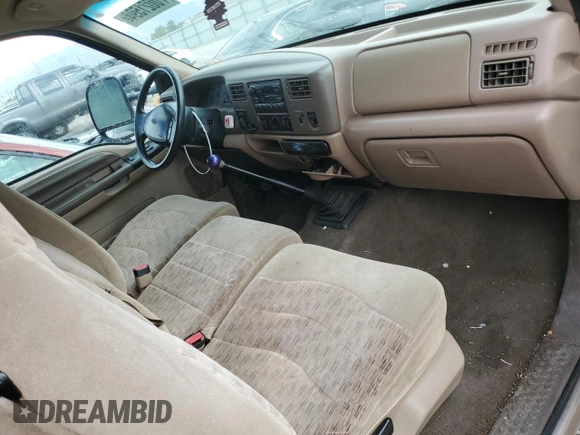 1999 Ford F-250 XL with VIN 1FTNX21F8XEE00658, listed as a Copart auction lot 70021594 with 218,084 mi miles and Non Repairable. Bid and sale history available at DreamBid. Image 8.