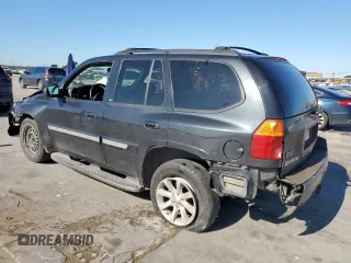 2003 GMC Envoy SLT z VIN 1GKDS13S332281271, wystawiony jako Copart lot #53685775 z przebiegiem 236 997 mil mil oraz Szkody całkowita. Historia ofert i sprzedaży dostępna na DreamBid. Obrazek 2.