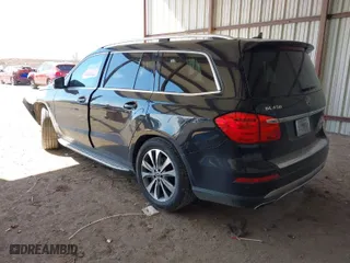 2013 Mercedes-Benz GL-Class GL 450 with VIN 4JGDF7CE7DA267258, listed as a IAAI auction lot 41634289 with 124,044 mi miles. Bid and sale history available at carsss.com. Image 3.