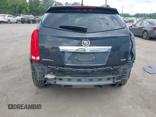 2014 Cadillac SRX Luxury Collection z VIN 3GYFNEE38ES626949, wystawiony jako IAAI lot #42194679 z przebiegiem 173 303 mil mil oraz . Historia ofert i sprzedaży dostępna na DreamBid. Obrazek 6.