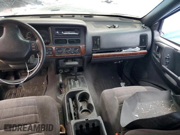 1997 Jeep Grand Cherokee Laredo with VIN 1J4GZ58Y0VC547880, listed as a Copart auction lot 79866684 with 0 mi miles and Salvage Title. Bid and sale history available at carsss.com. Image 8.