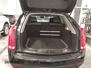 2011 Cadillac SRX Performance Collection with VIN 3GYFNEEY9BS675746, listed as a IAAI auction lot 41735676 with 113,079 mi miles and . Bid and sale history available at carsss.com. Image 12.