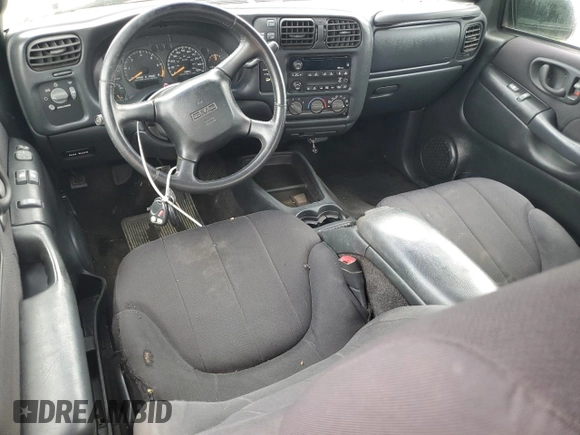 2003 GMC Sonoma SLS z VIN 1GTCT19X938201721, wystawiony jako Copart lot #56011695 z przebiegiem Nie podano mil oraz Nie do naprawy. Historia ofert i sprzedaży dostępna na DreamBid. Obrazek 8.