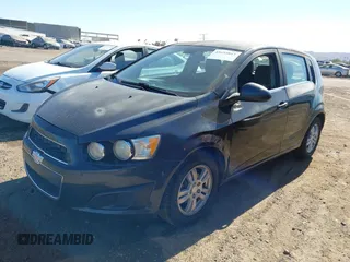2014 Chevrolet Sonic LT with VIN 1G1JC6SH1E4111523, listed as a IAAI auction lot 41693815 with 147,353 mi miles. Bid and sale history available at carsss.com. Image 2.