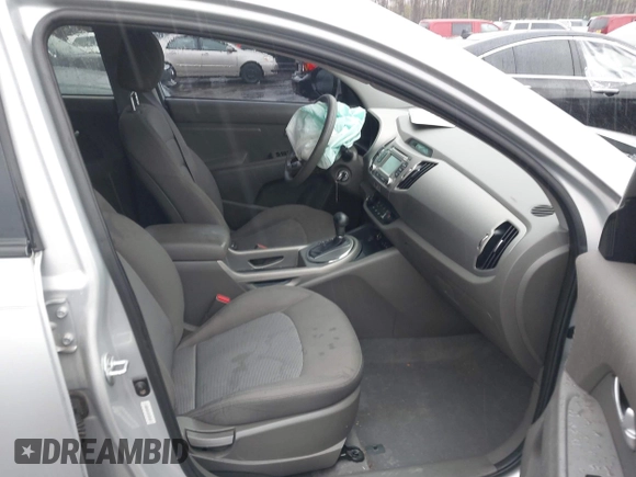 2014 Kia Sportage LX with VIN KNDPB3AC4E7582430, listed as a IAAI auction lot 41947229 with 140,680 mi miles. Bid and sale history available at carsss.com. Image 5.