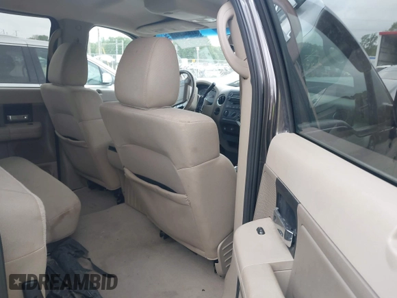 2006 Ford F-150 XLT with VIN 1FTRW12W96FA87318, listed as a IAAI auction lot 41936492 with 221,709 mi miles. Bid and sale history available at carsss.com. Image 8.