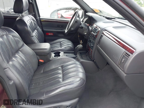 2000 Jeep Grand Cherokee Limited with VIN 1J4GW58N4YC423095, listed as a IAAI auction lot 42275933 with 135,684 mi miles and . Bid and sale history available at DreamBid. Image 5.