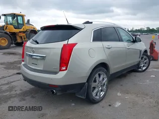 2014 Cadillac SRX Performance Collection z VIN 3GYFNCE35ES610504, wystawiony jako IAAI lot #42133548 z przebiegiem 140 306 mil mil oraz . Historia ofert i sprzedaży dostępna na DreamBid. Obrazek 4.