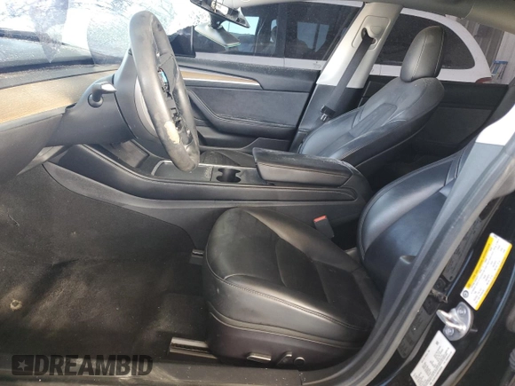 2021 Tesla Model 3 Standard Range Plus with VIN 5YJ3E1EA2MF048564, listed as a Copart auction lot 88754285 with 57,894 mi miles and Non Repairable. Bid and sale history available at DreamBid. Image 7.
