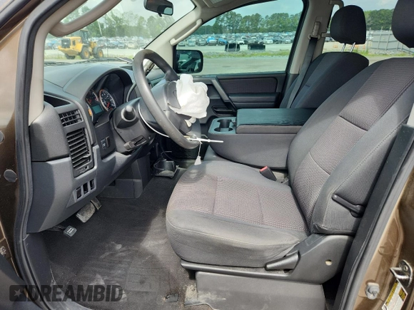 2009 Nissan Titan SE with VIN 1N6BA07D99N302396, listed as a Copart auction lot 59413545 with 181,688 mi miles and Salvage title. Bid and sale history available at DreamBid. Image 7.