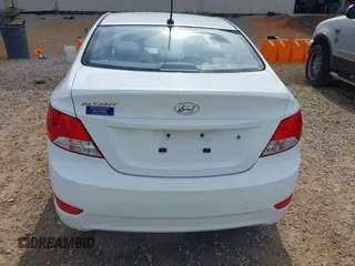 2014 Hyundai Accent GLS z VIN KMHCT4AE5EU697201, wystawiony jako IAAI lot #42157098 z przebiegiem 139 181 mil mil oraz . Historia ofert i sprzedaży dostępna na DreamBid. Obrazek 16.