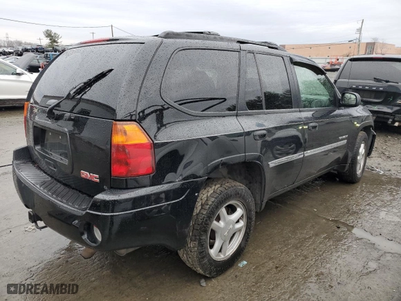 2006 GMC Envoy SLT with VIN 1GKDT13S862349565, listed as a Copart auction lot 83965094 with 0 mi miles and Salvage Title. Bid and sale history available at carsss.com. Image 3.