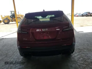 2019 Cadillac XT4 FWD Sport z VIN 1GYFZER44KF160024, wystawiony jako Copart lot #56767925 z przebiegiem 82 881 mil mil oraz Szkoda całkowita • Salvage title. Historia ofert i sprzedaży dostępna na DreamBid. Obrazek 6.