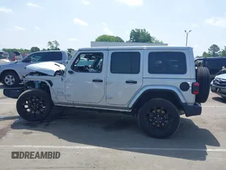 2024 Jeep Wrangler Sahara with VIN 1C4RJXP60RW292136, listed as a IAAI auction lot 42280063 with 26,701 mi miles and . Bid and sale history available at DreamBid. Image 14.
