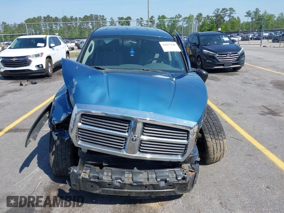 2005 Dodge Dakota SLT with VIN 1D7HW48N05S319621, listed as a IAAI auction lot 42037140 with 251,595 mi miles and . Bid and sale history available at DreamBid. Image 12.