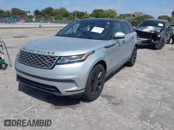 2020 Land Rover Range Rover Velar S z VIN SALYB2EXXLA255258, wystawiony jako IAAI lot #41823002 z przebiegiem 66 527 mil mil oraz . Historia ofert i sprzedaży dostępna na DreamBid. Obrazek 18.