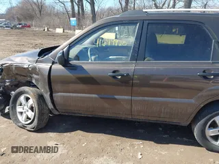 2010 Kia Sportage LX with VIN KNDKGCA32A7697677, listed as a IAAI auction lot 41694920 with 158,212 mi miles and . Bid and sale history available at carsss.com. Image 14.