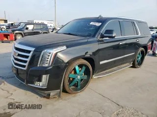 2015 Cadillac Escalade Luxury z VIN 1GYS4MKJ0FR663075, wystawiony jako Copart lot #57095705 z przebiegiem 156 988 mil mil oraz Tytuł czysty. Historia ofert i sprzedaży dostępna na DreamBid. Obrazek 1.