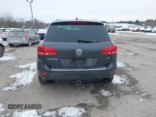 2012 Volkswagen Touareg Sport z VIN WVGEF9BP4CD008517, wystawiony jako IAAI lot #41386971 z przebiegiem 179 306 mil mil oraz . Historia ofert i sprzedaży dostępna na DreamBid. Obrazek 16.