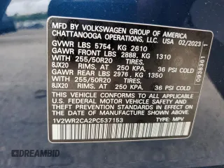 2023 Volkswagen Atlas SE z VIN 1V2WR2CA2PC537153, wystawiony jako Copart lot #74690524 z przebiegiem 10 628 mil mil oraz Szkoda całkowita • Salvage title. Historia ofert i sprzedaży dostępna na DreamBid. Obrazek 13.