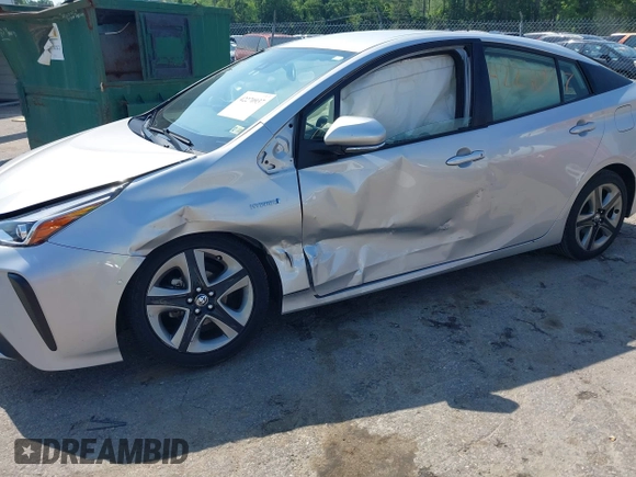 2021 Toyota Prius L Eco z VIN JTDKAMFU5M3137298, wystawiony jako IAAI lot #42270937 z przebiegiem 38 828 mil mil oraz . Historia ofert i sprzedaży dostępna na DreamBid. Obrazek 6.