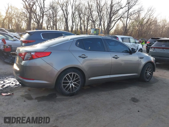 2013 Kia Optima LX with VIN 5XXGM4A77DG166140, listed as a IAAI auction lot 41881144 with 185,391 mi miles. Bid and sale history available at carsss.com. Image 13.