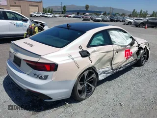 2018 Audi RS 5 z VIN WUAPWAF55JA903152, wystawiony jako IAAI lot #42193996 z przebiegiem 95 730 mil mil oraz . Historia ofert i sprzedaży dostępna na DreamBid. Obrazek 4.