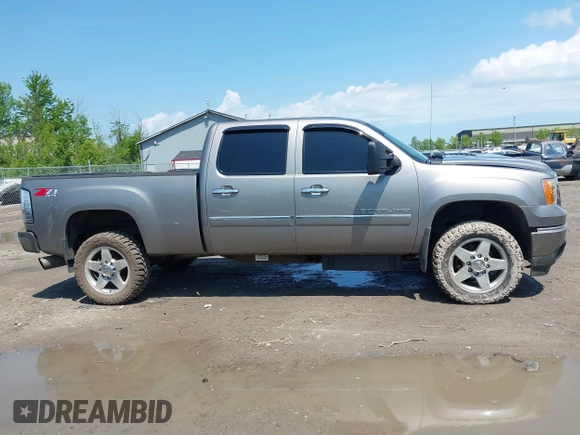 2013 GMC Sierra 2500HD Denali with VIN 1GT125E80DF154320, listed as a IAAI auction lot 42264742 with 171,013 mi miles and . Bid and sale history available at DreamBid. Image 13.
