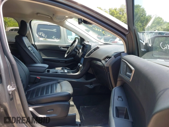 2024 Ford Edge SEL z VIN 2FMPK4J98RBA88719, wystawiony jako IAAI lot #42465705 z przebiegiem 26 101 mil mil oraz . Historia ofert i sprzedaży dostępna na DreamBid. Obrazek 5.