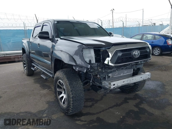 2015 Toyota Tacoma with VIN 3TMLU4EN8FM167337, listed as a IAAI auction lot 42117662 with 60,929 mi miles. Bid and sale history available at carsss.com. Image 1.