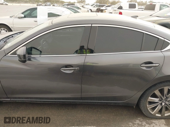 2020 Mazda 6 Signature with VIN JM1GL1XY6L1522900, listed as a IAAI auction lot 41724818 with 62,846 mi miles and . Bid and sale history available at DreamBid. Image 14.