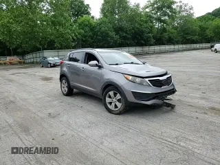 2012 Kia Sportage LX z VIN KNDPB3A20C7217165, wystawiony jako Copart lot #60999525 z przebiegiem 128 231 mil mil oraz Szkoda całkowita • Salvage title. Historia ofert i sprzedaży dostępna na DreamBid. Obrazek 14.