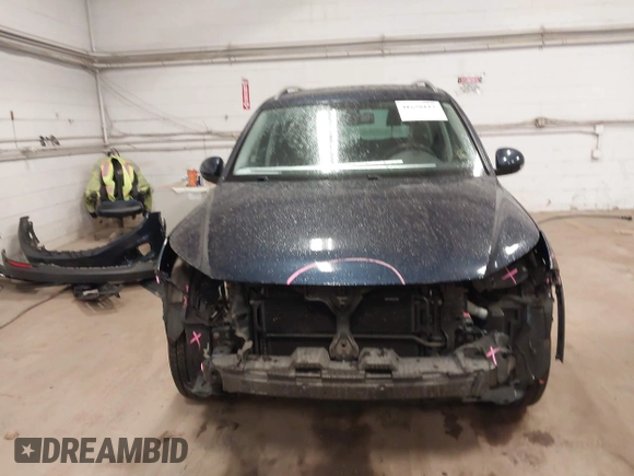 2016 Volkswagen Tiguan S with VIN WVGBV7AX6GW029794, listed as a IAAI auction lot 41698112 with 73,084 mi miles and . Bid and sale history available at DreamBid. Image 12.