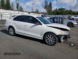 2011 Volkswagen Jetta SE with VIN 3VWDX7AJ0BM322566, listed as a Copart auction lot 51536505 with 143,266 mi miles and Salvage title. Bid and sale history available at DreamBid. Image 4.