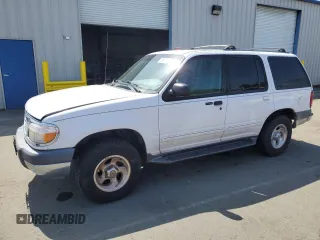 2000 Ford Explorer XLT z VIN 1FMZU73E9YZB62644, wystawiony jako Copart lot #55182995 z przebiegiem 103 368 mil mil oraz Tytuł czysty. Historia ofert i sprzedaży dostępna na DreamBid. Obrazek 1.