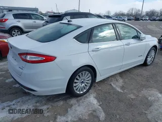 2014 Ford Fusion SE Hybrid with VIN 3FA6P0LU4ER243067, listed as a IAAI auction lot 41378720 with 129,625 mi miles. Bid and sale history available at carsss.com. Image 4.