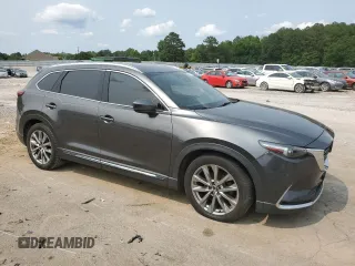 2017 Mazda CX-9 Grand Touring z VIN JM3TCADYXH0138805, wystawiony jako Copart lot #59201915 z przebiegiem 147 896 mil mil oraz Czysty tytuł • Clean title. Historia ofert i sprzedaży dostępna na DreamBid. Obrazek 4.
