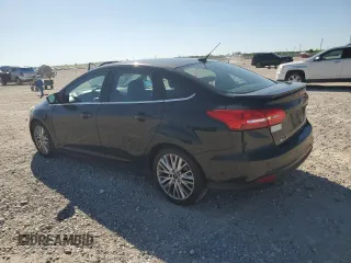 2015 Ford Focus Titanium with VIN 1FADP3J24FL305710, listed as a Copart auction lot 52413155 with 181,571 mi miles and Clean Title. Bid and sale history available at carsss.com. Image 2.