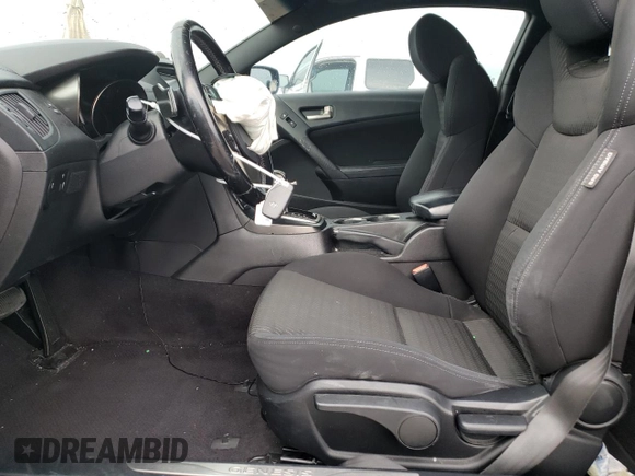 2014 Hyundai Genesis Coupe 2.0T z VIN KMHHT6KD1EU114887, wystawiony jako Copart lot #52775804 z przebiegiem 76 891 mil mil oraz Szkoda całkowita • Salvage title. Historia ofert i sprzedaży dostępna na DreamBid. Obrazek 7.