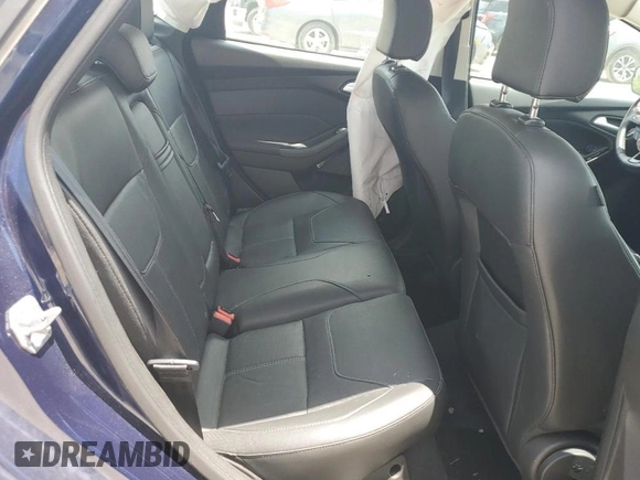2016 Ford Focus SE z VIN 1FADP3F23GL288232, wystawiony jako Copart lot #62565095 z przebiegiem 11 634 mil mil oraz Szkoda całkowita • Salvage title. Historia ofert i sprzedaży dostępna na DreamBid. Obrazek 10.