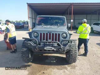 2015 Jeep Wrangler Unlimited Sport с VIN 1C4BJWDG6FL774275, выставлен на аукционе IAAI как лот 41984611 с пробегом 113 726 миль миль и . История ставок и продаж доступна на DreamBid. Изображение 12.
