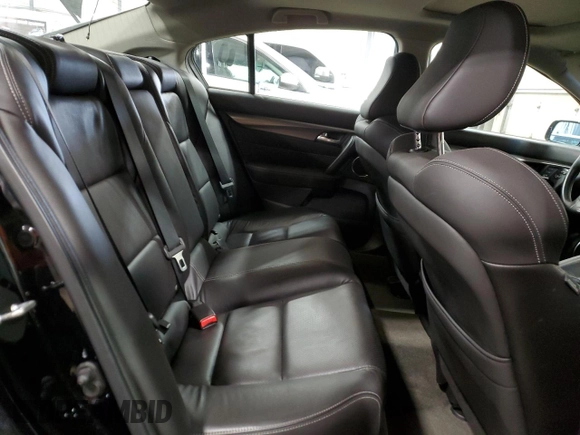 2013 Acura TL Advance z VIN 19UUA9F72DA001692, wystawiony jako Copart lot #85898354 z przebiegiem 75 489 mil mil oraz Szkoda całkowita • Salvage title. Historia ofert i sprzedaży dostępna na DreamBid. Obrazek 10.